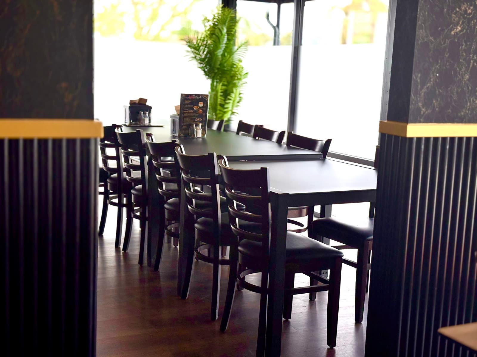 A long window table set for a big family meal